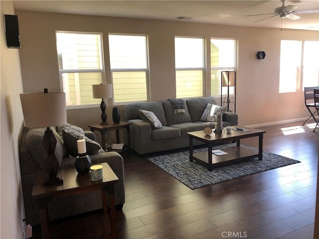 707 Joseph Pl, Isleton, CA 95641 - living area with a ceiling fan and dark wood-style floors