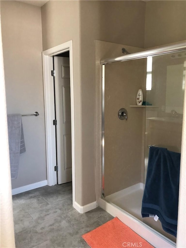 707 Joseph Pl, Isleton, CA 95641 - full bathroom featuring a stall shower and baseboards