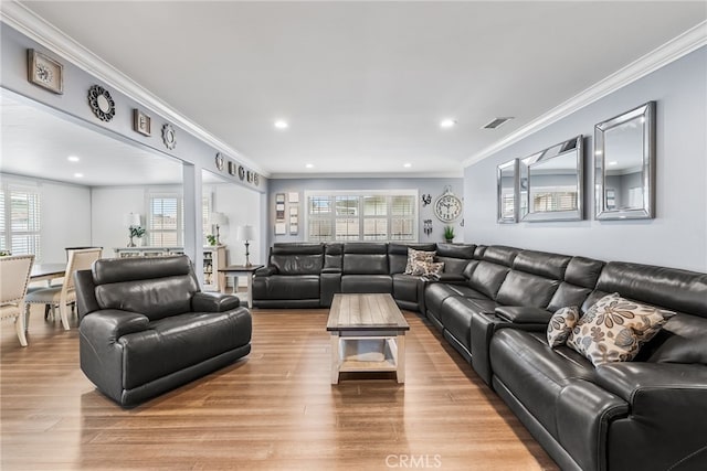 10041 Margo Ln, Westminster, CA 92683 - living area featuring crown molding, light wood-style floors, and recessed lighting