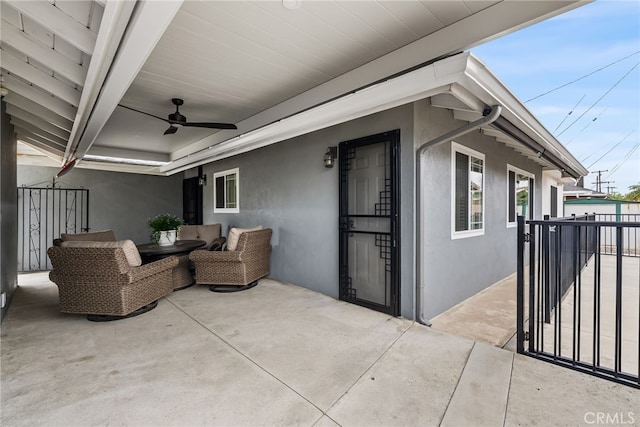 10041 Margo Ln, Westminster, CA 92683 - view of patio featuring ceiling fan and a gate