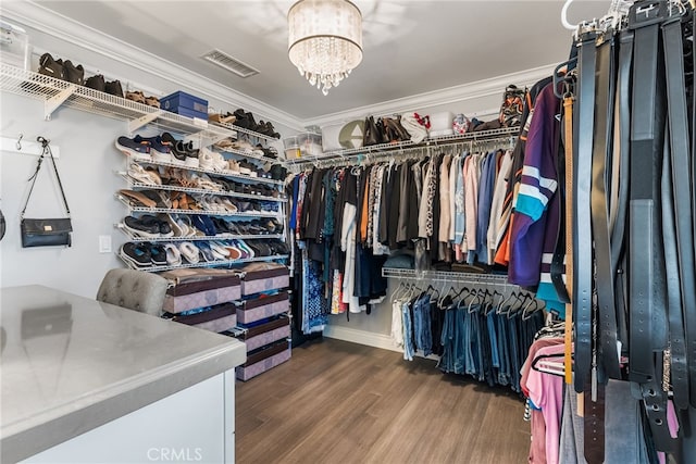 10041 Margo Ln, Westminster, CA 92683 - spacious closet featuring a chandelier and wood finished floors