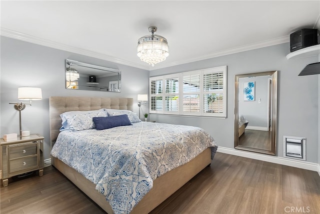 10041 Margo Ln, Westminster, CA 92683 - bedroom featuring wood finished floors, crown molding, and a chandelier