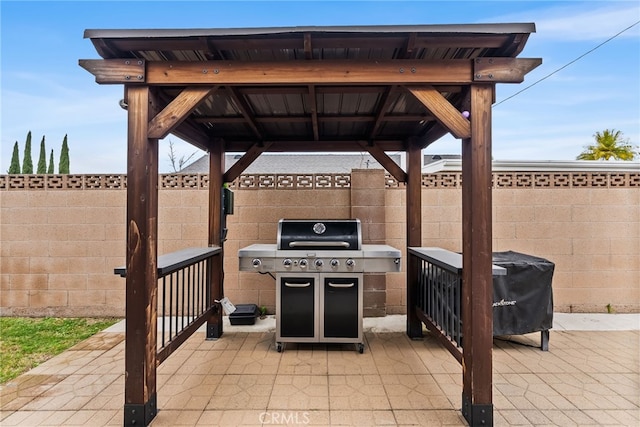 10041 Margo Ln, Westminster, CA 92683 - fenced backyard featuring area for grilling, a patio area, and a gazebo