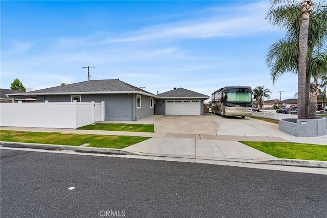 10041 Margo Ln, Westminster, CA 92683 - single story home with driveway, an attached garage, stucco siding, and roof with shingles
