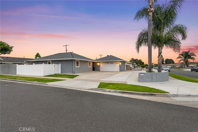 10041 Margo Ln, Westminster, CA 92683 - ranch-style house with driveway, a garage, and stucco siding