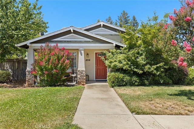 1654 E Ave, Chico, CA 95926 - view of front of property featuring stucco siding and covered porch