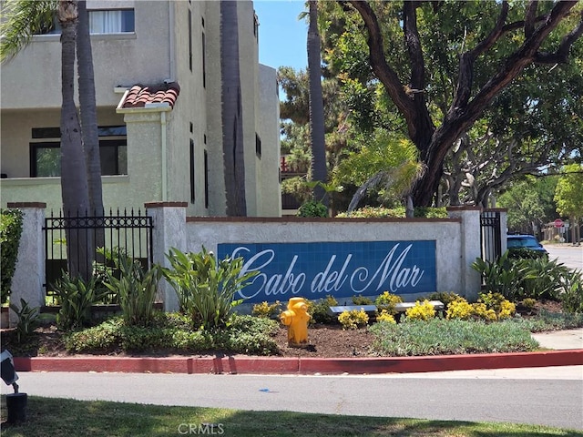 5101 Tortuga Dr Unit 211, Huntington Beach, CA 92649 - view of community / neighborhood sign