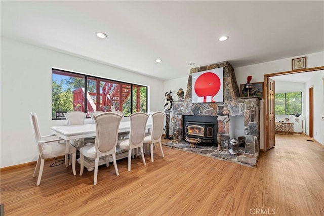 1104 Snowbird Dr, Frazier Park, CA 93225 - dining space with light wood finished floors, a wood stove, and recessed lighting