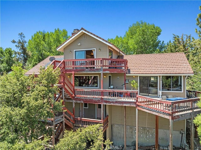 1104 Snowbird Dr, Frazier Park, CA 93225 - rear view of property with a chimney, a deck, and stairway