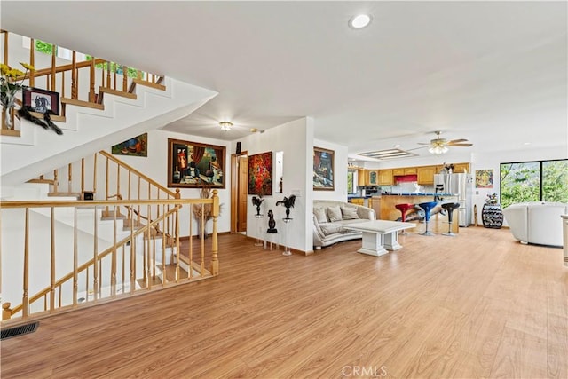 1104 Snowbird Dr, Frazier Park, CA 93225 - living area with light wood finished floors, a ceiling fan, stairs, and recessed lighting