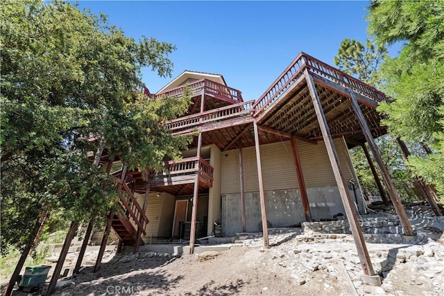 1104 Snowbird Dr, Frazier Park, CA 93225 - rear view of property with a deck and stairs