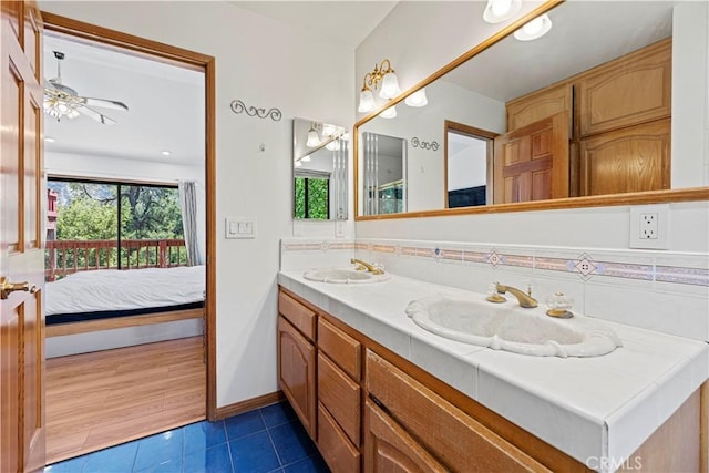 1104 Snowbird Dr, Frazier Park, CA 93225 - ensuite bathroom with tile patterned floors, double vanity, and plenty of natural light