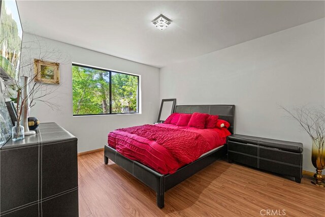 1104 Snowbird Dr, Frazier Park, CA 93225 - bedroom featuring wood finished floors and baseboards
