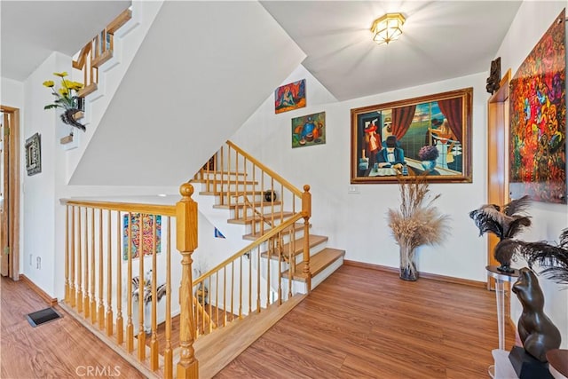 1104 Snowbird Dr, Frazier Park, CA 93225 - stairway featuring wood finished floors and lofted ceiling