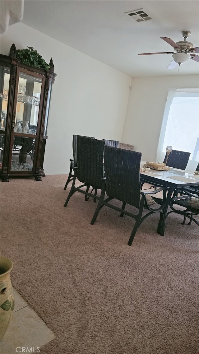 13749 Starshine Dr, Victorville, CA 92392 - dining room with light colored carpet and a ceiling fan