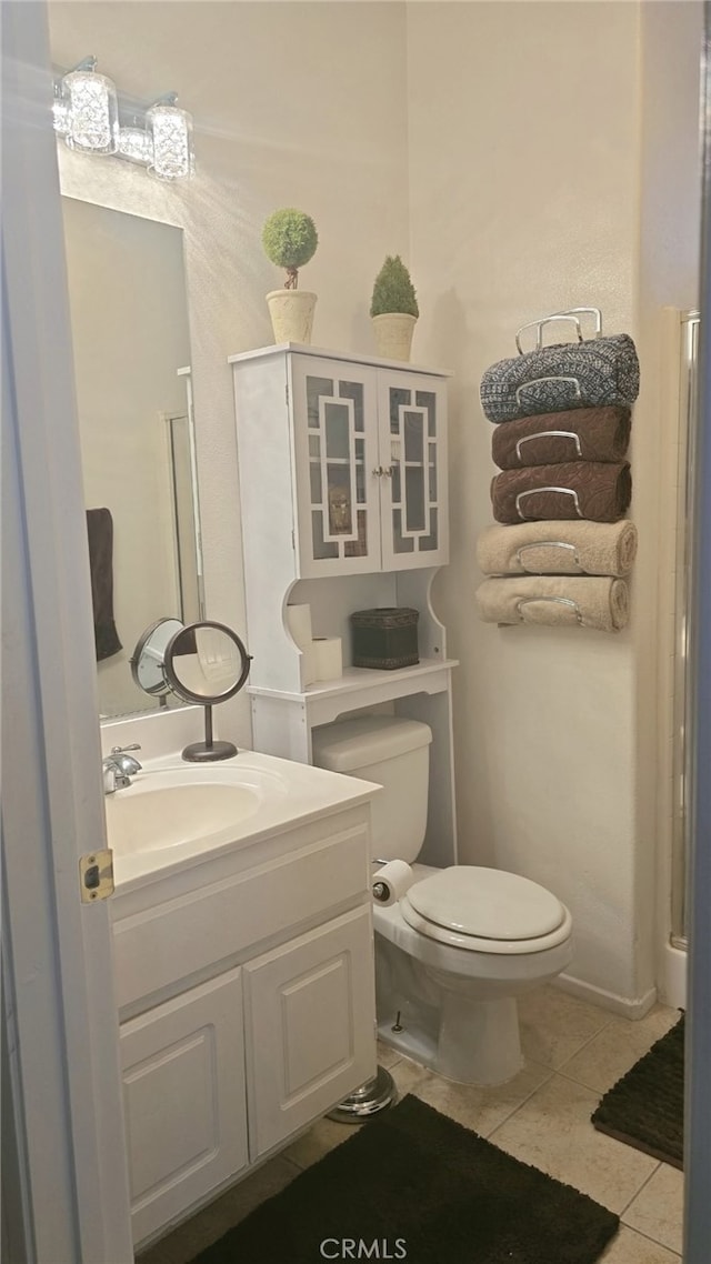 13749 Starshine Dr, Victorville, CA 92392 - bathroom featuring tile patterned flooring and vanity