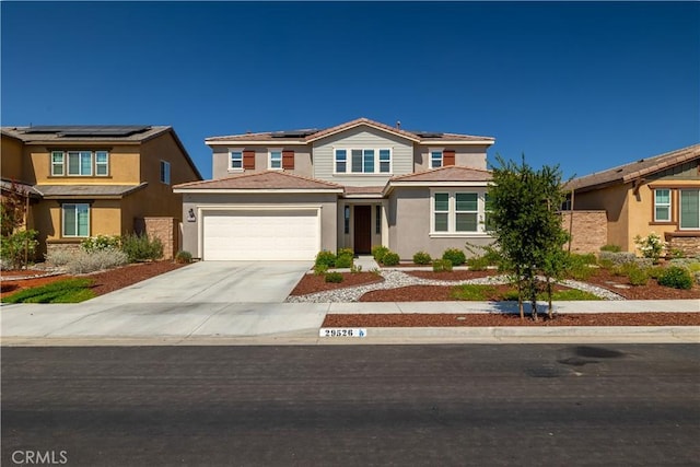 29526 Woodcreek Trl, Winchester, CA 92596 - traditional home featuring driveway, a garage, roof mounted solar panels, and stucco siding