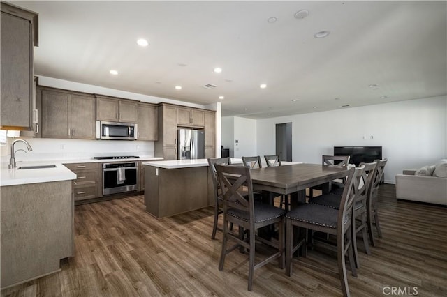 29526 Woodcreek Trl, Winchester, CA 92596 - dining room featuring dark wood-style floors and recessed lighting