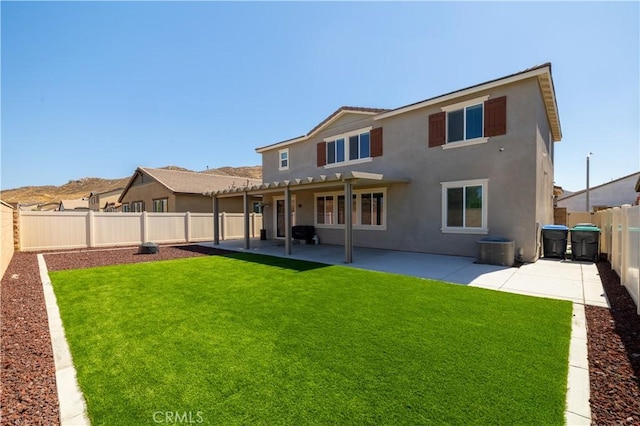 29526 Woodcreek Trl, Winchester, CA 92596 - back of property with a fenced backyard, stucco siding, and a patio area