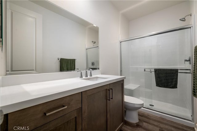 29526 Woodcreek Trl, Winchester, CA 92596 - bathroom with wood finished floors, a stall shower, and vanity