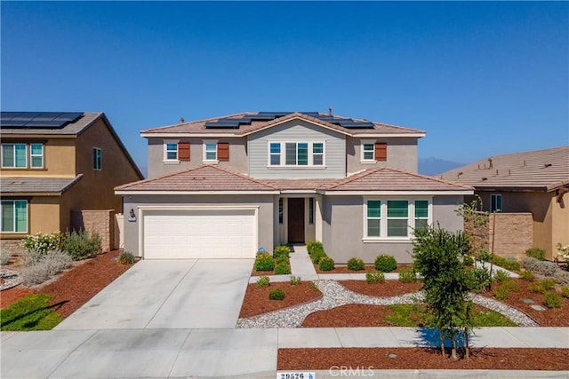 29526 Woodcreek Trl, Winchester, CA 92596 - traditional-style house featuring concrete driveway, an attached garage, solar panels, and stucco siding