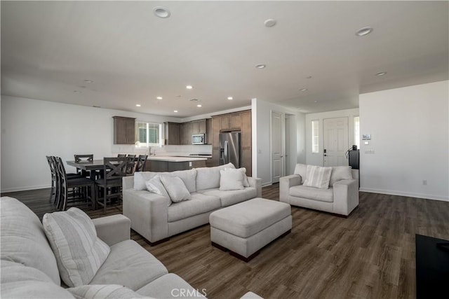 29526 Woodcreek Trl, Winchester, CA 92596 - living room with dark wood finished floors and recessed lighting