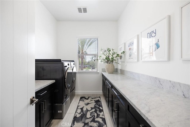 41783 Valencia Way, Temecula, CA 92592 - laundry area with washer and dryer and cabinet space