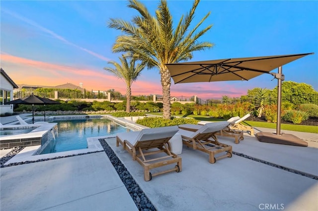 41783 Valencia Way, Temecula, CA 92592 - pool at dusk with a patio and a pool with connected hot tub