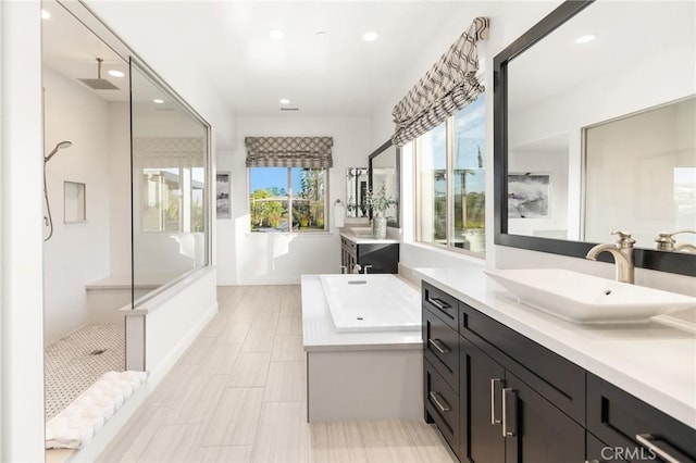 41783 Valencia Way, Temecula, CA 92592 - full bath with a walk in shower, vanity, recessed lighting, and a tub