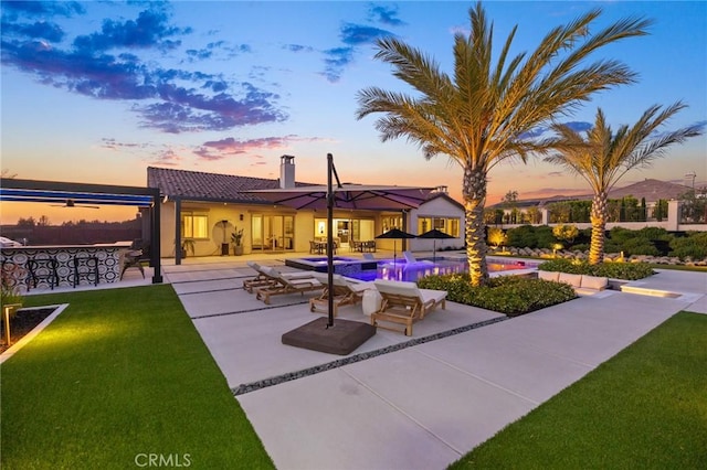 41783 Valencia Way, Temecula, CA 92592 - view of home's community featuring a patio area, a pool, and a yard