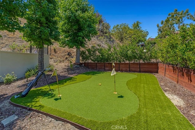 2056 Dublin Dr, Glendale, CA 91206 - fenced backyard featuring a putting area