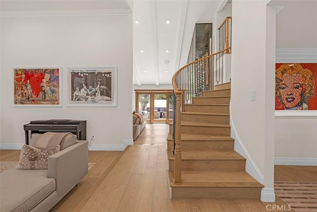 2056 Dublin Dr, Glendale, CA 91206 - staircase featuring wood finished floors, recessed lighting, a high ceiling, and french doors