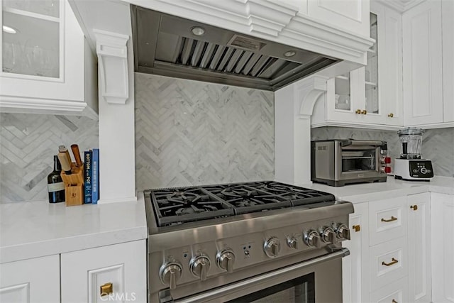 2056 Dublin Dr, Glendale, CA 91206 - kitchen with high end range, custom range hood, backsplash, light countertops, and white cabinetry