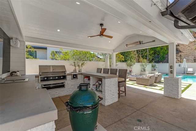 2056 Dublin Dr, Glendale, CA 91206 - fenced backyard featuring exterior kitchen, an outdoor hangout area, a patio area, and ceiling fan