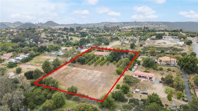 16151 Sunset Way, Valley Center, CA 92082 - aerial view of property and surrounding area with a mountain backdrop and property parcel outlined