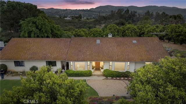 16151 Sunset Way, Valley Center, CA 92082 - back of property featuring stucco siding and a mountain view