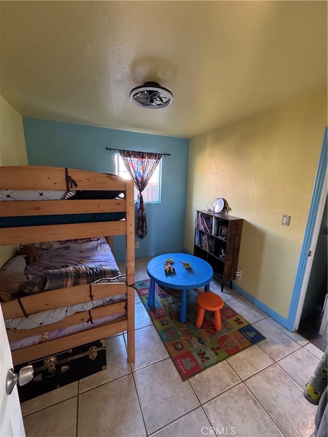 825 E Eagle St, Long Beach, CA 90806 - bedroom featuring light tile patterned floors