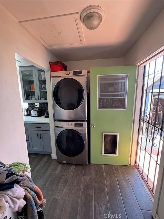 825 E Eagle St, Long Beach, CA 90806 - laundry area with estacked washer and dryer and dark wood finished floors