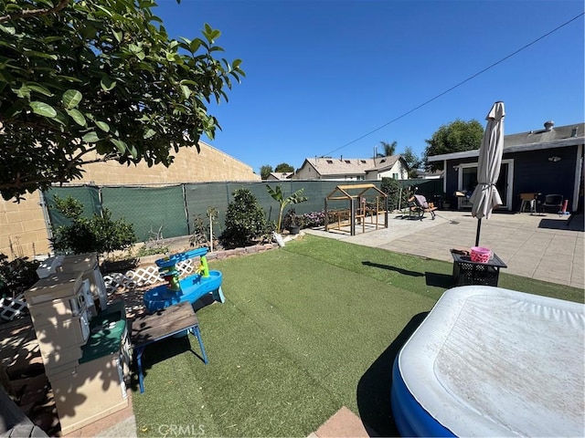 825 E Eagle St, Long Beach, CA 90806 - fenced backyard featuring a patio