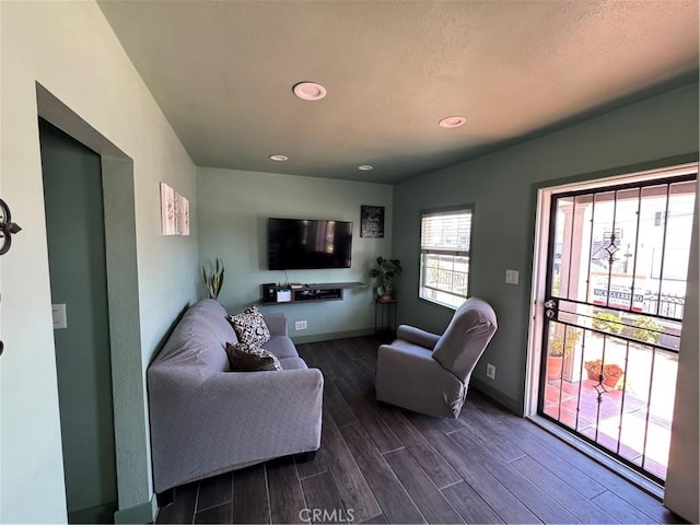 825 E Eagle St, Long Beach, CA 90806 - living area with dark wood-type flooring and recessed lighting