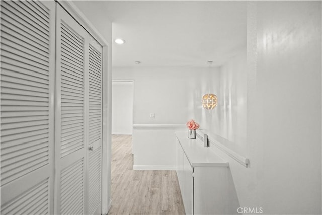 1495 Mccabe Way, West Covina, CA 91791 - hall with light wood finished floors, a chandelier, and recessed lighting