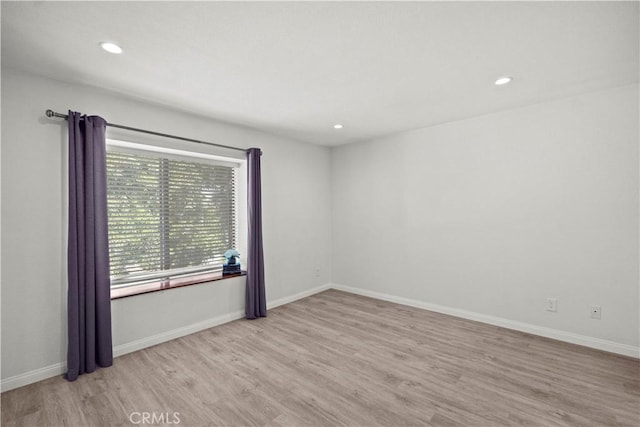 1495 Mccabe Way, West Covina, CA 91791 - empty room featuring wood finished floors and recessed lighting