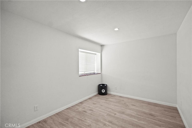 1495 Mccabe Way, West Covina, CA 91791 - spare room with wood finished floors and recessed lighting