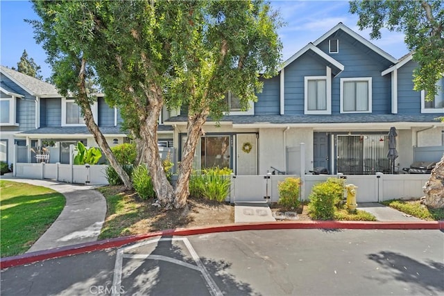 1495 Mccabe Way, West Covina, CA 91791 - multi unit property with a gate, a fenced front yard, and uncovered parking