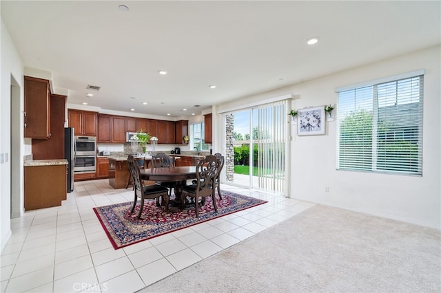 13243 Stanton Dr, Rancho Cucamonga, CA 91739 - dining space featuring light tile patterned floors, recessed lighting, and light colored carpet