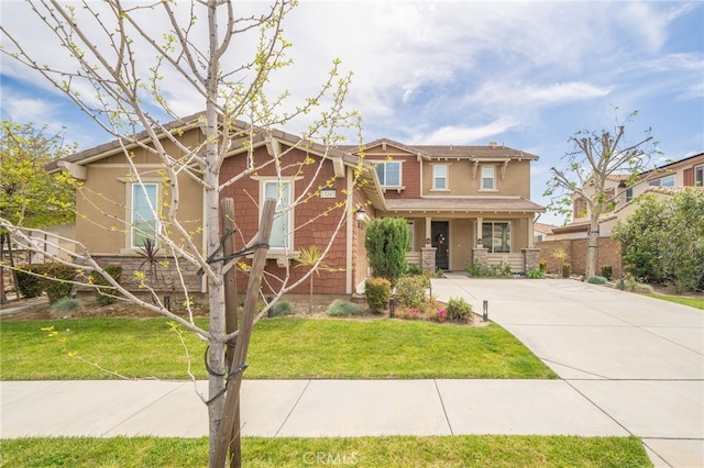 13243 Stanton Dr, Rancho Cucamonga, CA 91739 - view of front of house featuring stucco siding, driveway, and a front lawn