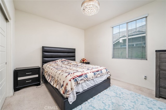 13243 Stanton Dr, Rancho Cucamonga, CA 91739 - carpeted bedroom featuring a chandelier and baseboards