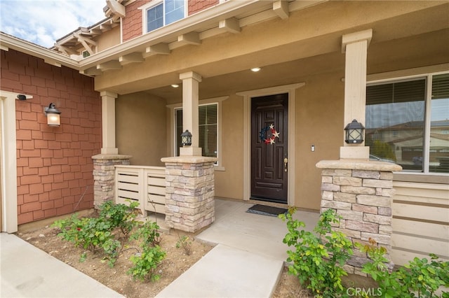 13243 Stanton Dr, Rancho Cucamonga, CA 91739 - view of exterior entry featuring covered porch and stucco siding