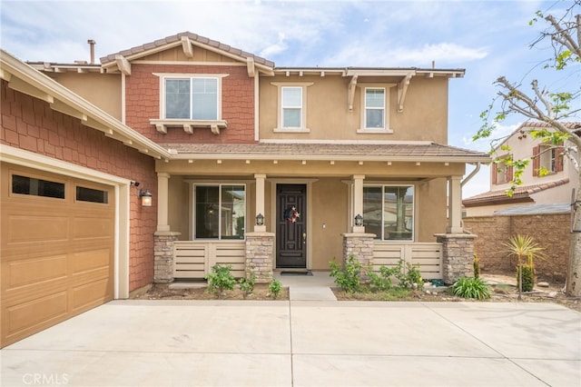 13243 Stanton Dr, Rancho Cucamonga, CA 91739 - craftsman-style house with covered porch, concrete driveway, stone siding, stucco siding, and a garage