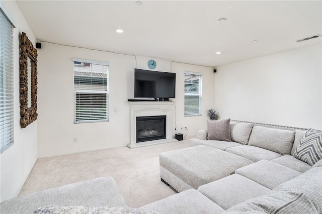 13243 Stanton Dr, Rancho Cucamonga, CA 91739 - living area with carpet, a glass covered fireplace, and recessed lighting
